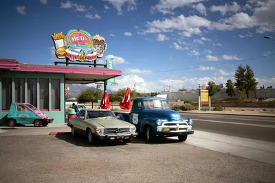 Vintage cars parked outside Mr. D'z Route 66 Diner in Kingman, Arizona