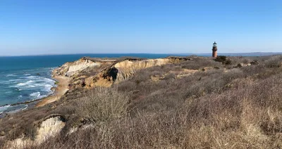 Scenic view of the Aquinnah Lighthouse and clay cliffs on Martha's Vineyard coast