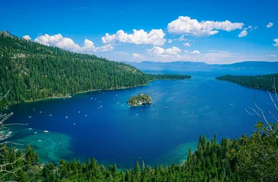 Breathtaking aerial view of Lake Tahoe's Emerald Bay and Fannette Island under a clear blue sky
